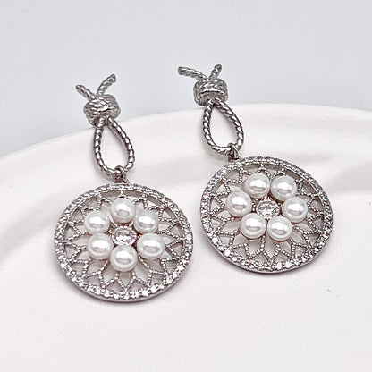 Retro Wind. Pearl Earring and Ring in Silver 925. Wheel