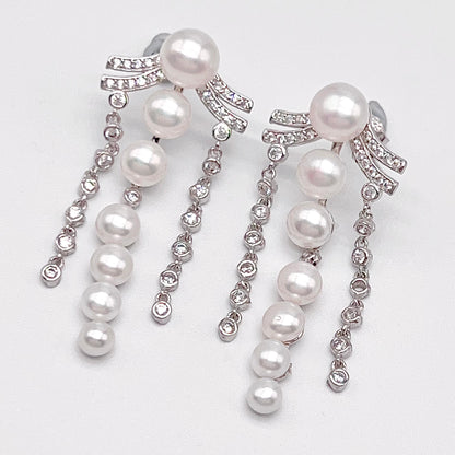 Retro Wind. Pearl Earring and Ring in Silver 925. 3 Fringe