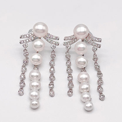 Retro Wind. Pearl Earring and Ring in Silver 925. 3 Fringe