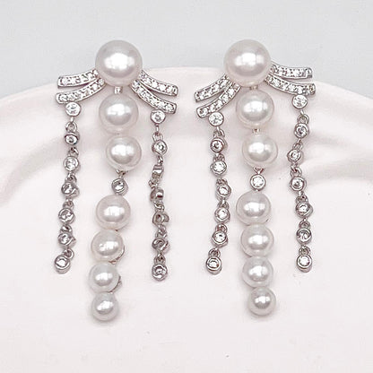 Retro Wind. Pearl Earring and Ring in Silver 925. 3 Fringe