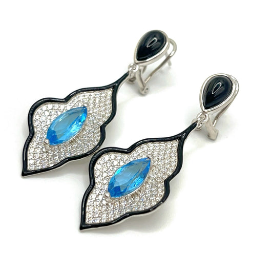 Earing in silver with topaz